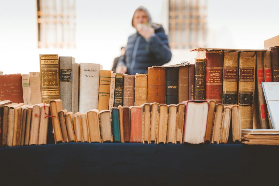 person browsing old books
