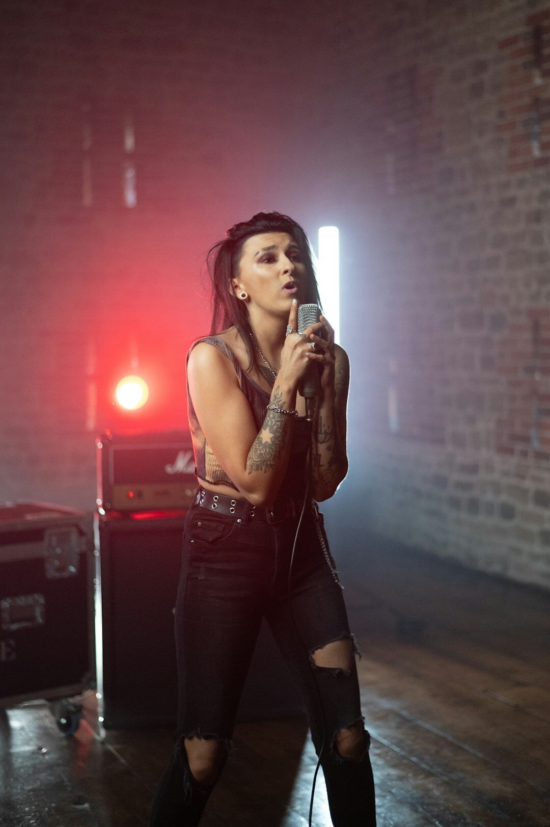 Portrait of a Uruguayan singer holding a microphone